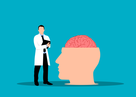 Graphic of a doctor in a white coat holding a black clipboard standing next to an enlarged head with the brain exposed. Image by Mohamed Hassan from Pixabay